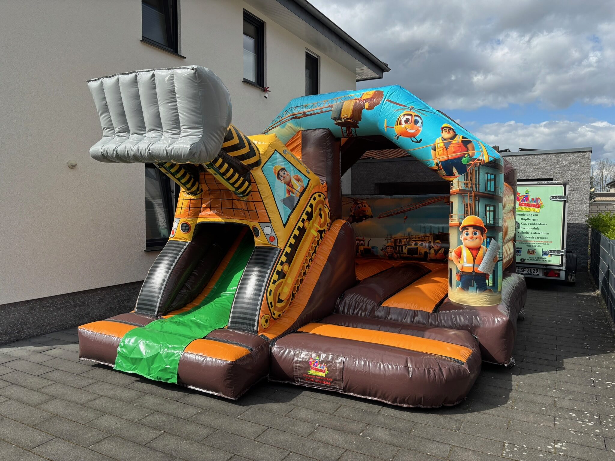 Hüpfburg Bagger mieten in Versmold - Hauptbild - Schneider Funworld